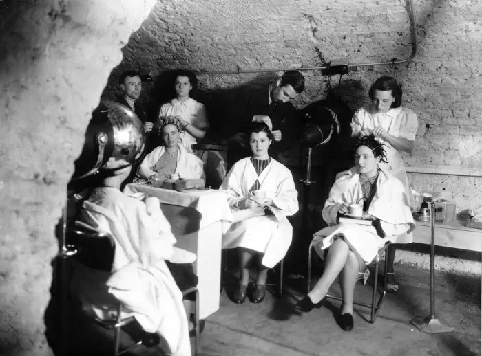 Framed Print : Hairdressers carry on working in an underground air raid shelter during WW2 Framed Print : Hairdressers carry on working in an underground air raid shelter during WW2