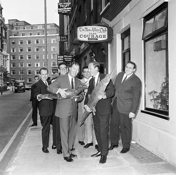 Bill Haley and bandleader Chris Barber are pictured with The Comets outside the Tin Pan