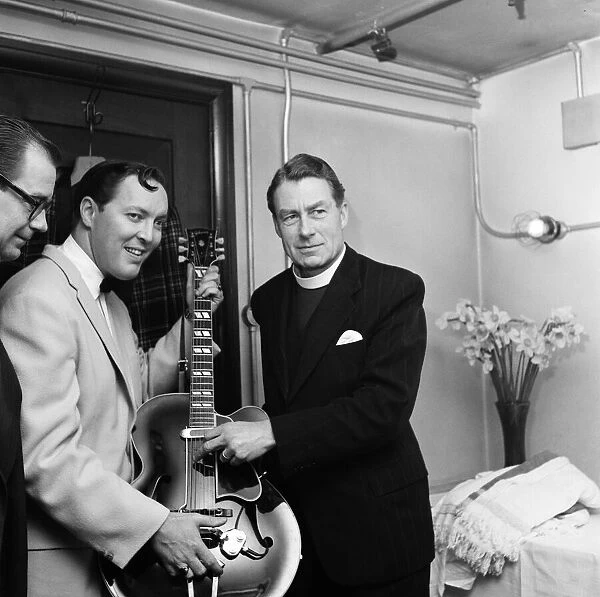 Bill Haley on his first visit to England seen here with the Bishop of Woolwich Rt Rev