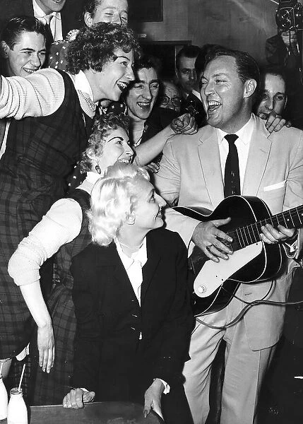 Bill Haley of Bill Haley and the Comits performing in front of an audience