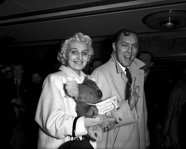 Bill Haley with his wife leave London airport on their way back to America after a tour