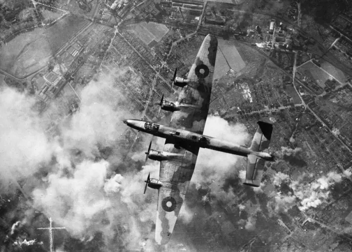 Framed Print : A Halifax bomber of RAF Bomber Command in flight over the target area during a raid Framed Print : A Halifax bomber of RAF Bomber Command in flight over the target area during a raid