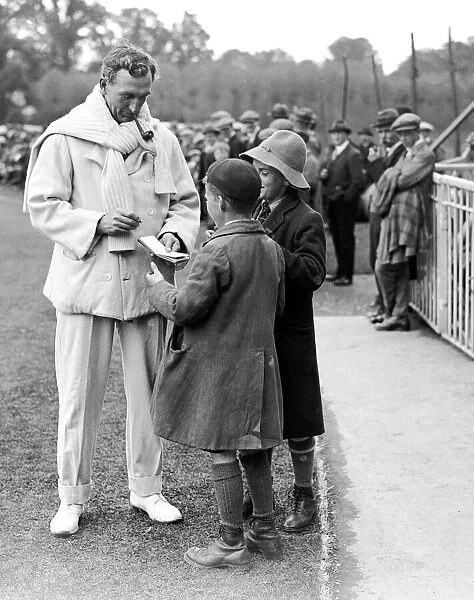 Hampshire v. Yorkshire. Charles Burgess Fry of Hampshire signing an autograph