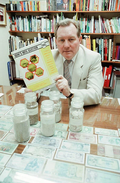 Hank Sharpe, Travel Agent, shows off his collection of sand, Middlesbrough