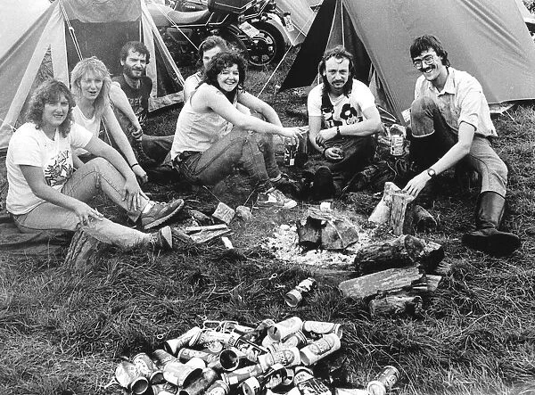 Happy campers make time for a cold beer at the Hell