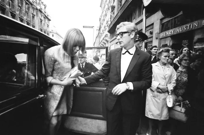 Framed Print : Harlow film premiere. Michael Caine arrives with Lucianna Paluzzi Framed Print : Harlow film premiere. Michael Caine arrives with Lucianna Paluzzi