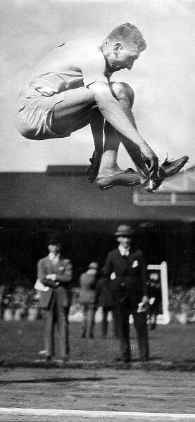 Harold Abrahams seen here competing in the Long Jump at the aA meeting at Stamford