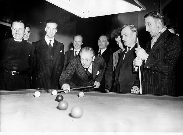 Harold MacMillan Prime Minister playing snooker with seaman
