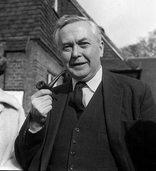 Harold Wilson with his famous pipe after voting in the Greater London Elections in