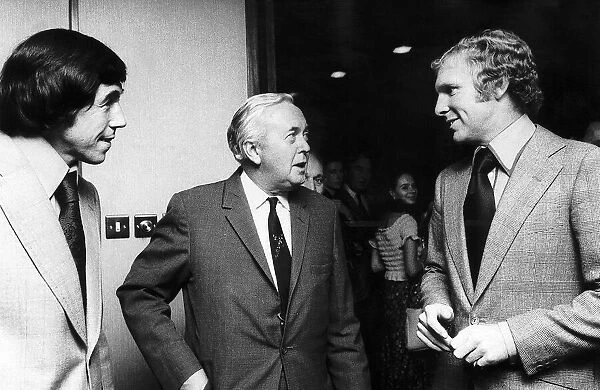 Harold Wilson Labour Prime Minister of Britain chats to Bobby Moore former captain of