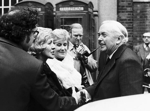 Harold Wilson MP meeting supporters as he leaves the Transport House after the press