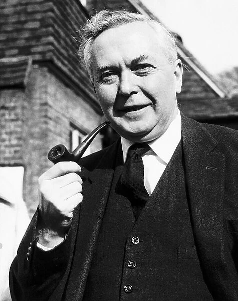 Harold Wilson MP smoking his pipe 1964