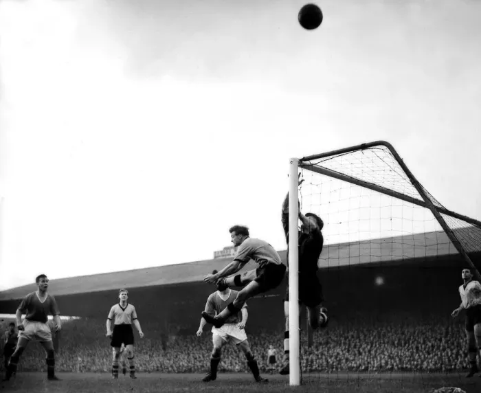 Framed Print : Harris (Wolves left back) and Finlayson (goalkeeper) both go up for header from taylor Framed Print : Harris (Wolves left back) and Finlayson (goalkeeper) both go up for header from taylor
