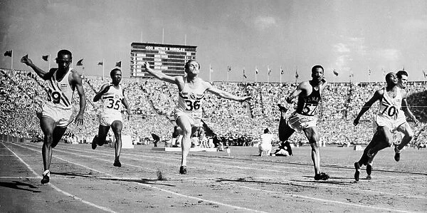 Harrison Dillard crossing the finishing line in the 1948 London Olympic Games 100 metre