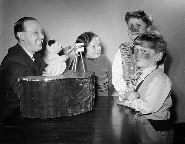 Harry Corbett and Sooty, the Teddy Bear Magician are seen here at home in Guisley