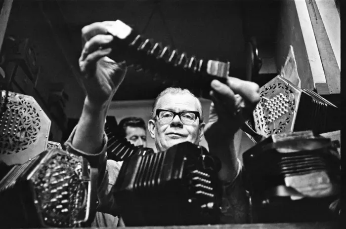Framed Print : Harry Crabb seen here with his son Neville making concertina
