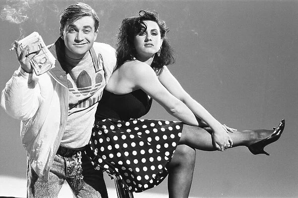 Harry Enfield poses with Fiona Riley. 4th March 1988