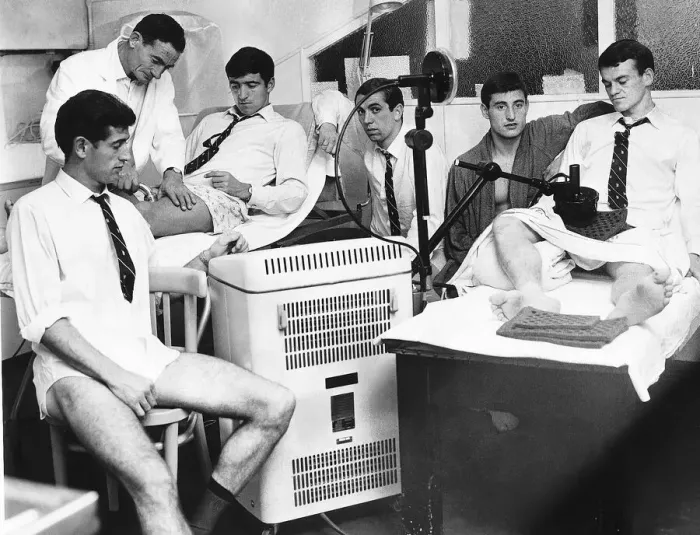 Framed Print : Harry Meadows the Trainer for Chelsea FC 1965 treats Terry Venables