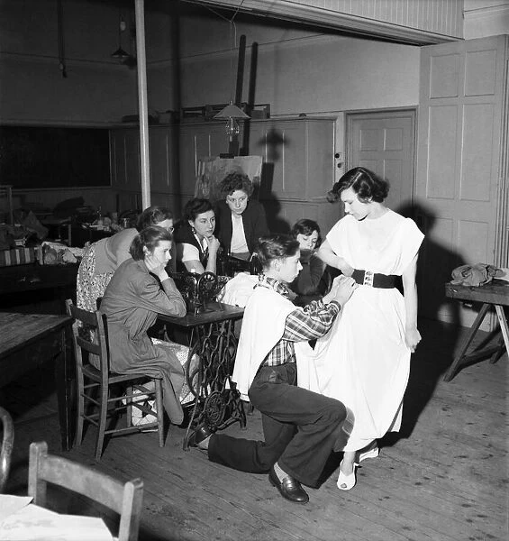 Harry Ogle (16) - Dress Designer seen here fitting one of his designs
