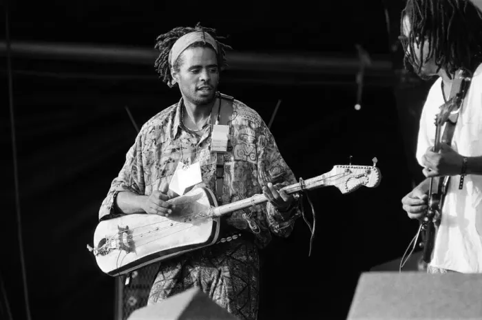 Framed Print : Hassan Hakmoun performing at WOMAD festival at Rivermead in Reading, Berkshire