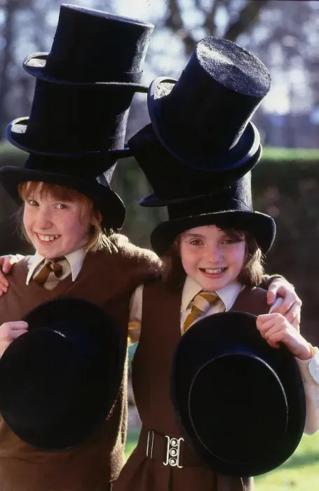 Framed Print : Hat Fashion Schoolgirls wear top hats, February 1989 Framed Print : Hat Fashion Schoolgirls wear top hats, February 1989