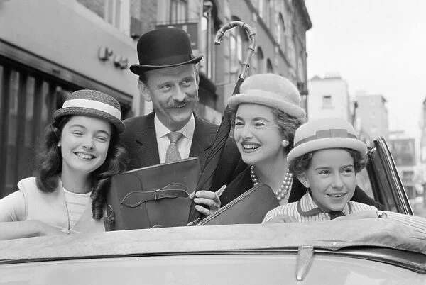 Hats by Milliner Victor Hyett seen here modelled in a London street prior to the 1959