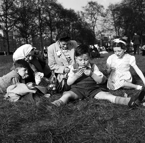 The Hayden family have a picnic in St Jamess Park, London. April 1952
