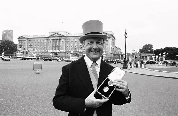 Head of Laker Airways Freddie Laker at Buckingham Palace after being knighted by