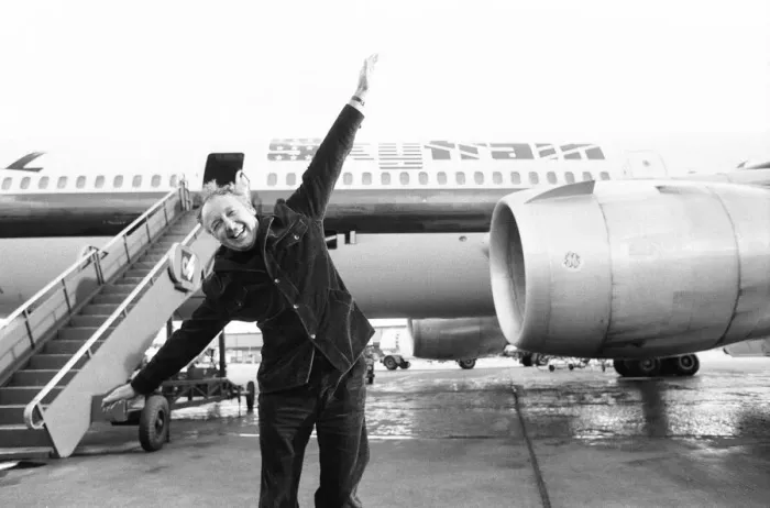 Framed Print : Head of Laker Airways Freddie Laker in jubilant mood on the runway at Gatwick airport