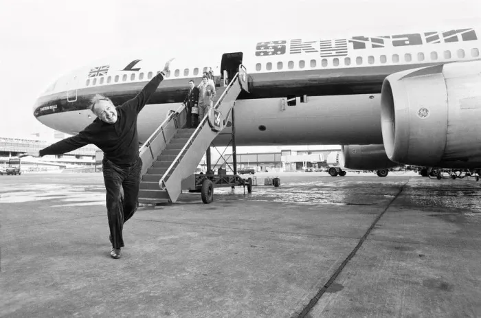 Framed Print : Head of Laker Airways Freddie Laker in jubilant mood on the runway at Gatwick airport Framed Print : Head of Laker Airways Freddie Laker in jubilant mood on the runway at Gatwick airport