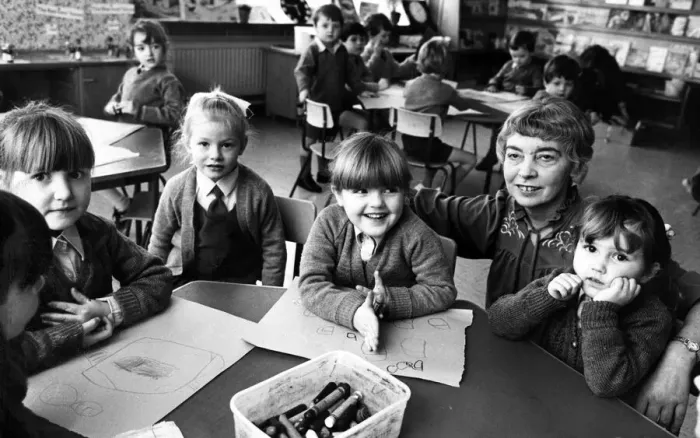 Framed Print : Head teacher Rita Shreenan with pupils at St Brigids Catholic Primary School
