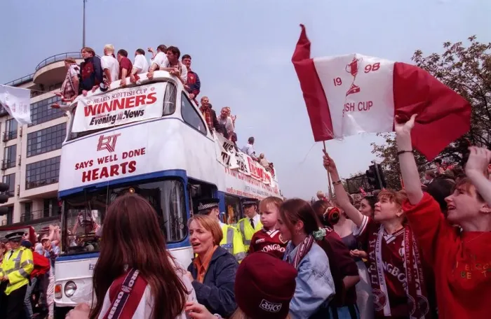 Framed Print : Heart of Midlothian footballers are cheered by fans as they celebrate with the Scottish Framed Print : Heart of Midlothian footballers are cheered by fans as they celebrate with the Scottish