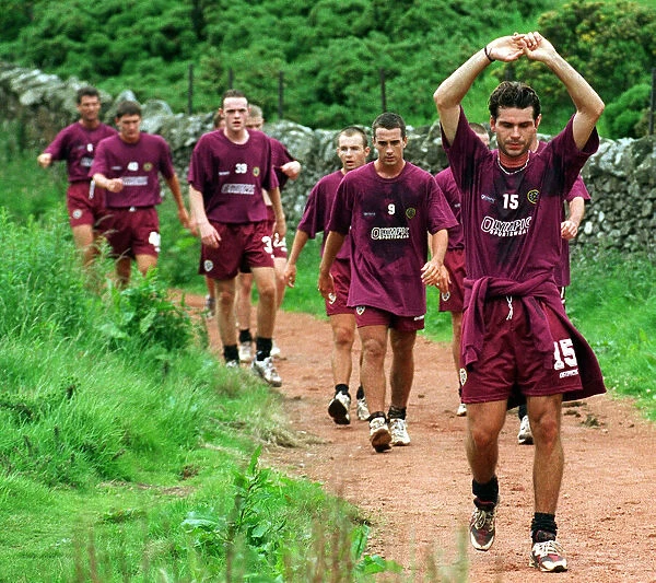 Heart of Midlothian players being led by Stephane Adame during the first day of training