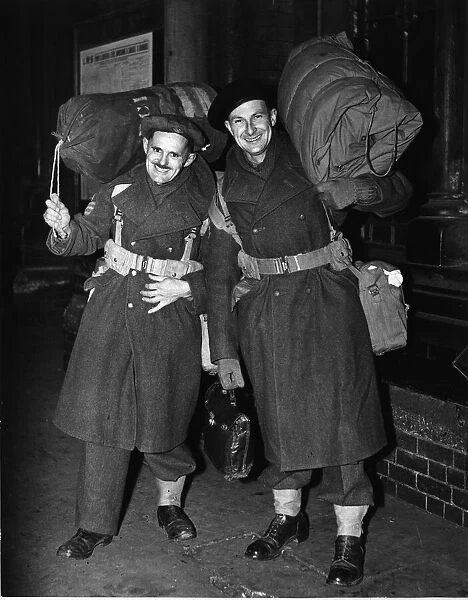 Two heavily laden soldiers of the British Army, Sergeants Lester (left) and Jarvis