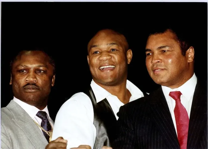 Framed Print : Former heavyweight boxing champion Joe Frazier (left) pictured with George Foreman