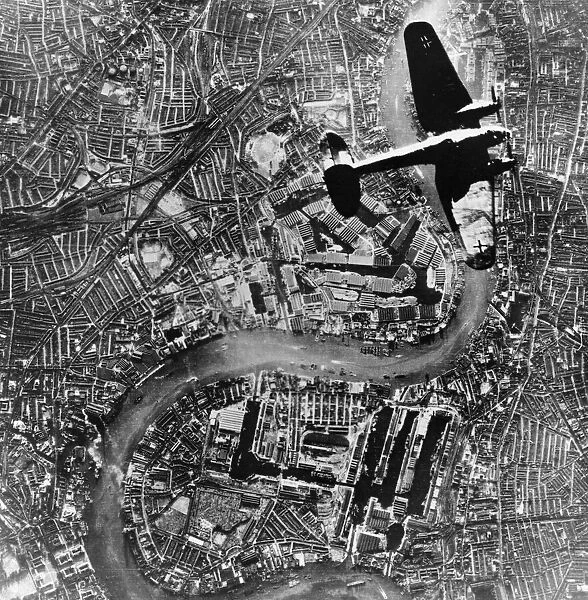 A Heinkel 111 bomber aircraft of the German Luftwaffe flies over Tower Bridge