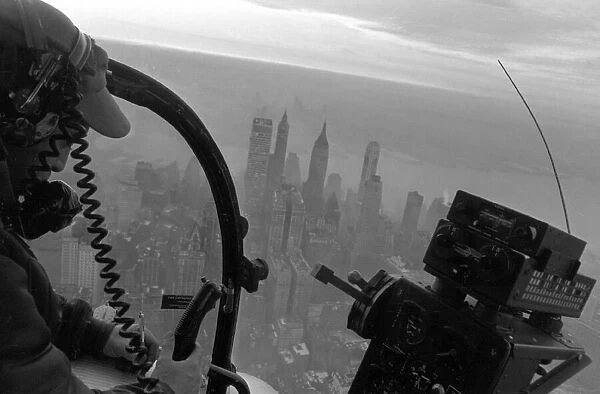 A helicopter over flies New York to monitor the Manhattan Traffic 14th February 1964