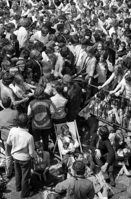 Framed Print : Hells Angels help pass a collapsed fan forward to the fist aid attendants at free Rolling Framed Print : Hells Angels help pass a collapsed fan forward to the fist aid attendants at free Rolling