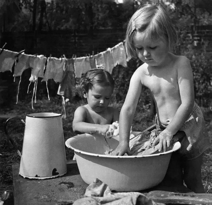Framed Print : Helping to wash the smalls. Ann Dowling aged 4 and Pauline Carey aged 2 1  /  2