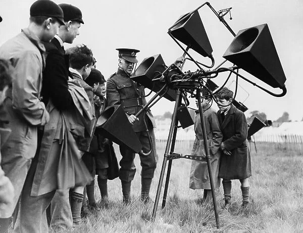 Hendon air day, youngsters being shown anti aircraft sound