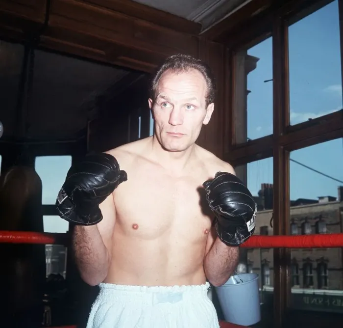 Framed Print : Henry Cooper Boxer in gym standing with hands up in sparing pose 11th October 1987