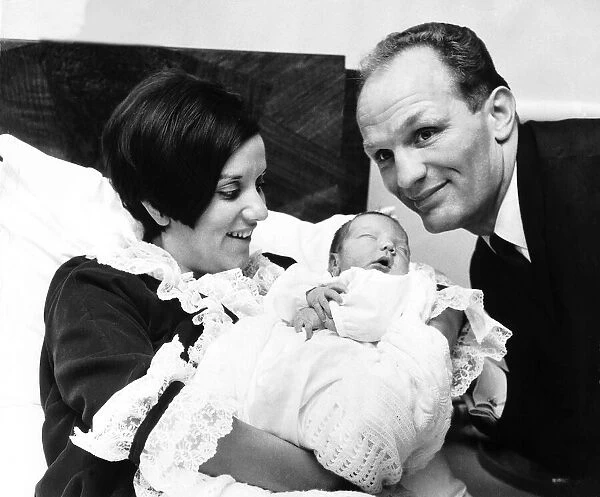 Henry Cooper boxer with wife and new born baby August 1967
