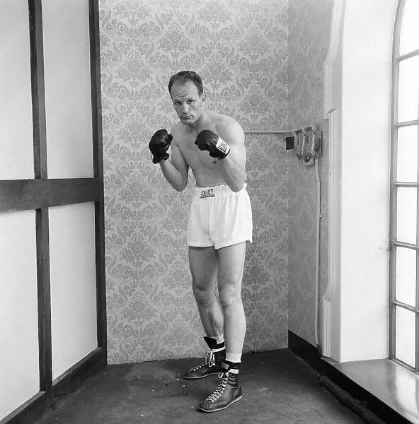 Henry Cooper, British Commonwealth Heavyweight Champion, pictured during training session