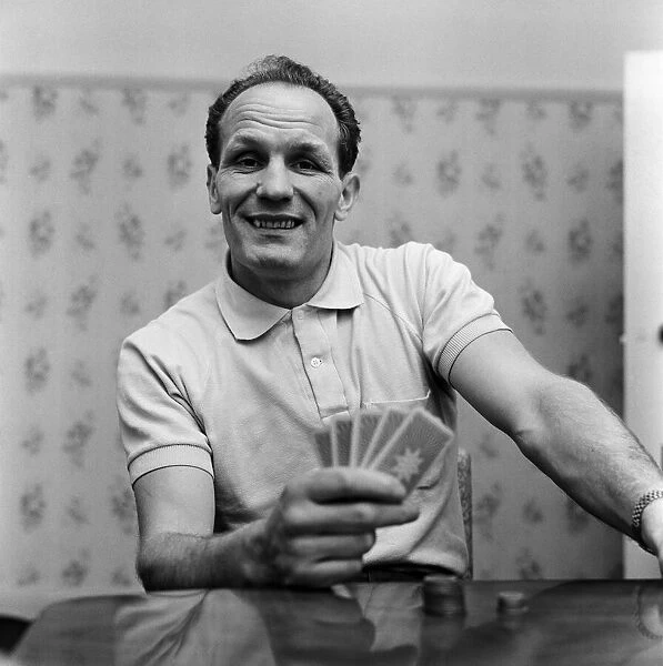 Henry Cooper spending the eve of his big fight against Cassius Clay relaxing at his