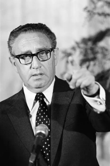 Framed Print : Henry Kissinger speaking at a press conference, answering questions about his latest book
