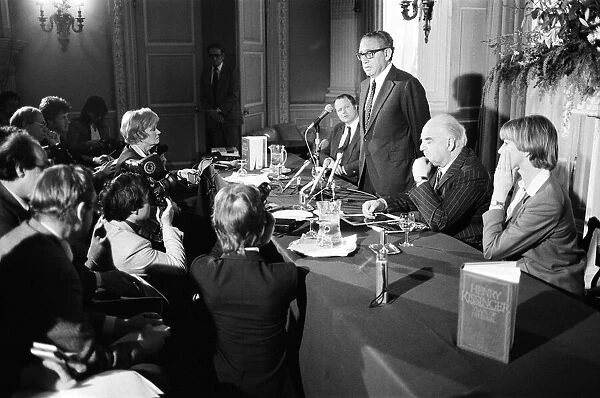 Henry Kissinger speaking at a press conference, answering questions about his latest book