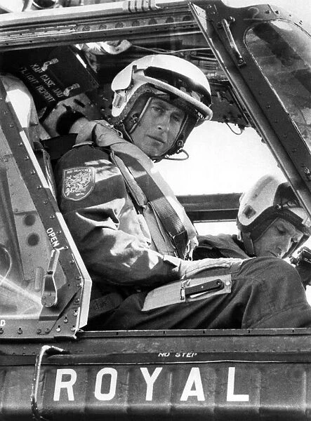 High Flyer Prince Charles at the controls of a helicopter in September 1974 during his