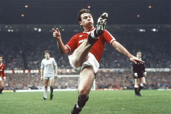 A high kick from Brian McClair. Manchester United 1-1 Liverpool