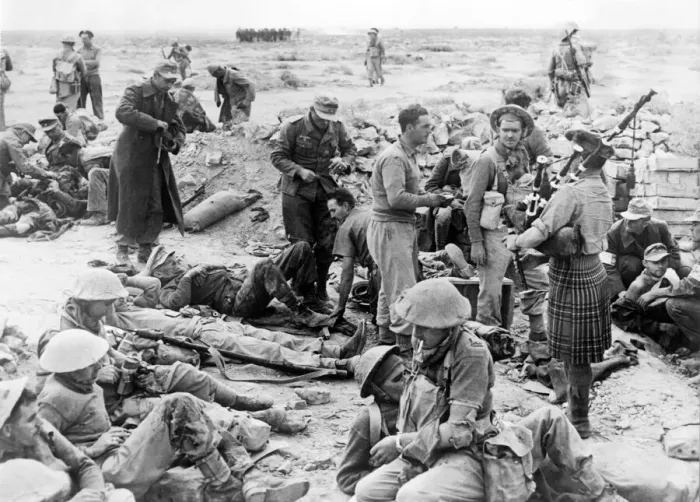 Framed Print : A Highland piper entertains wounded soldiers at a casualty clearing station during