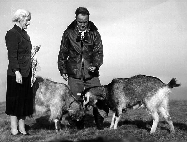 Hilbre Island custodian Charles Clifton and his wife Jean feeding their two goats